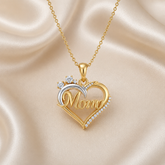 A gold heart-shaped pendant necklace with the word &